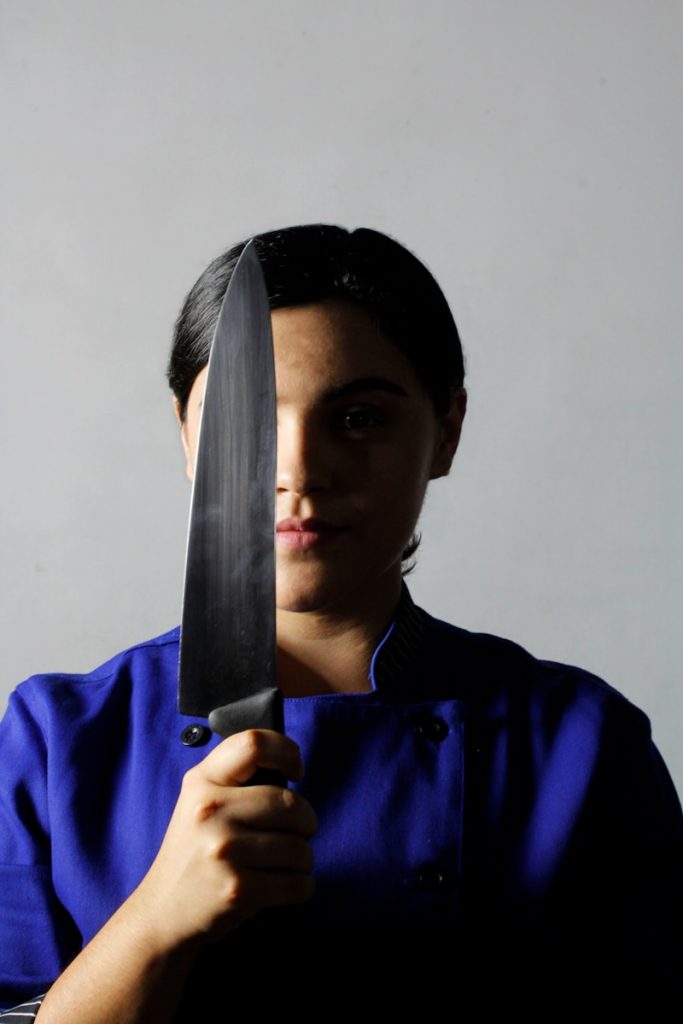 woman holding knife